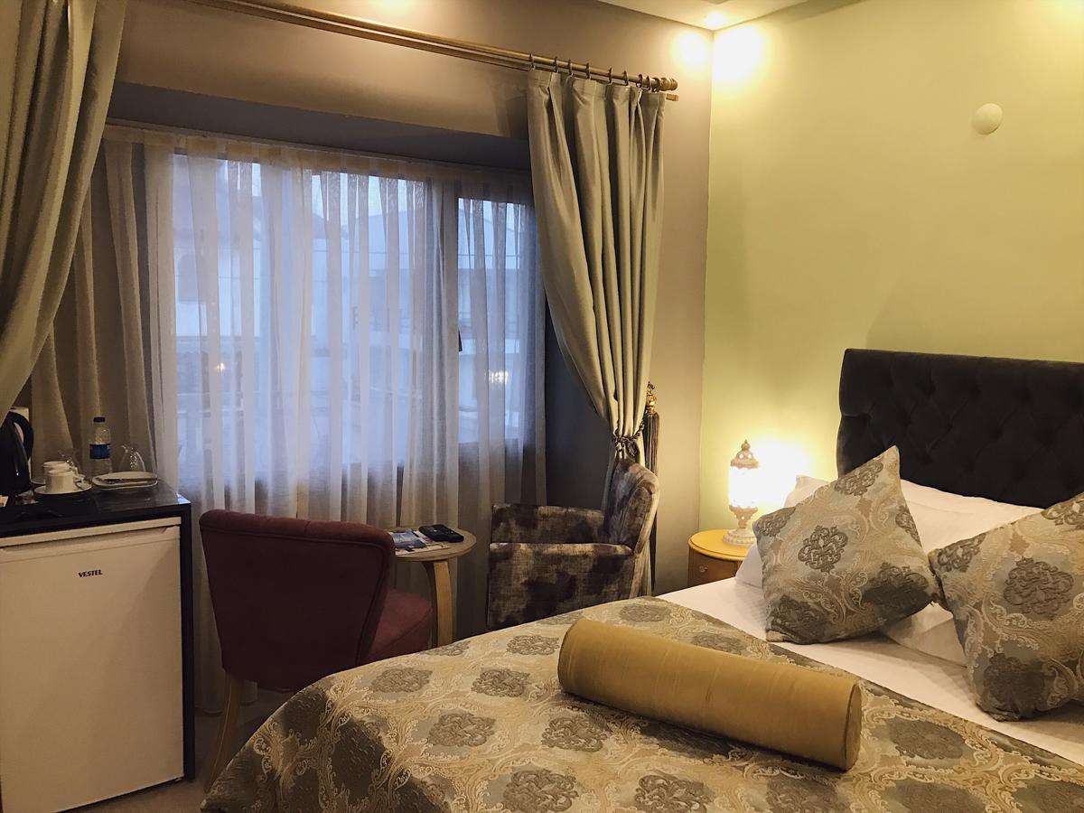 Itimat Otel 乌尔拉 外观 照片